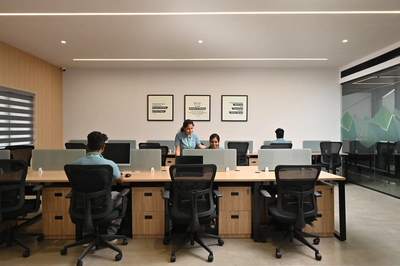 AQOZA team at work on the open-plan engineering floor